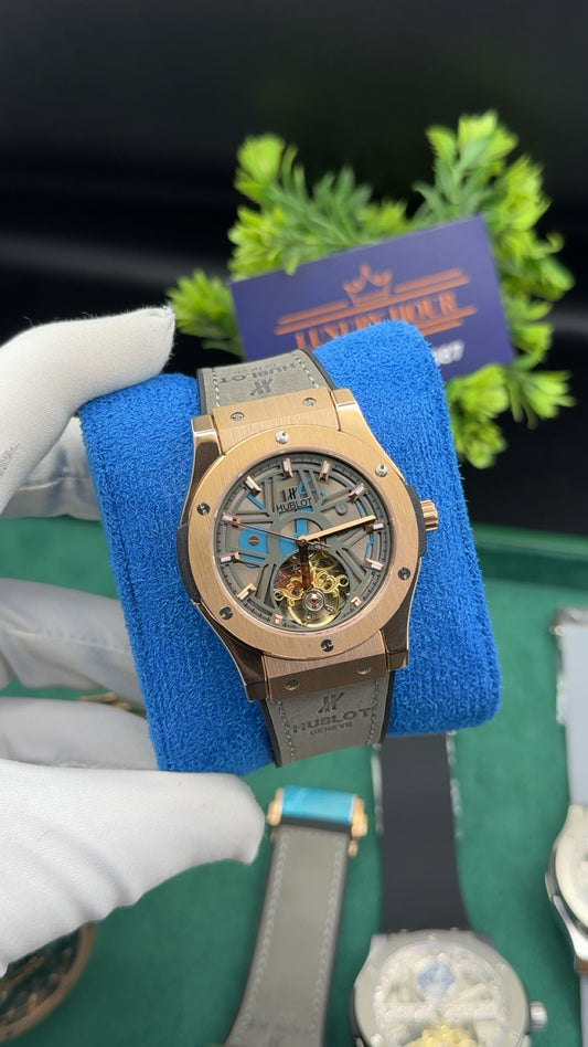 Rose gold with grey dial