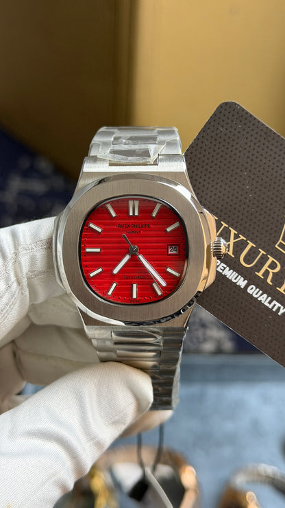 Silver with Red Dial.