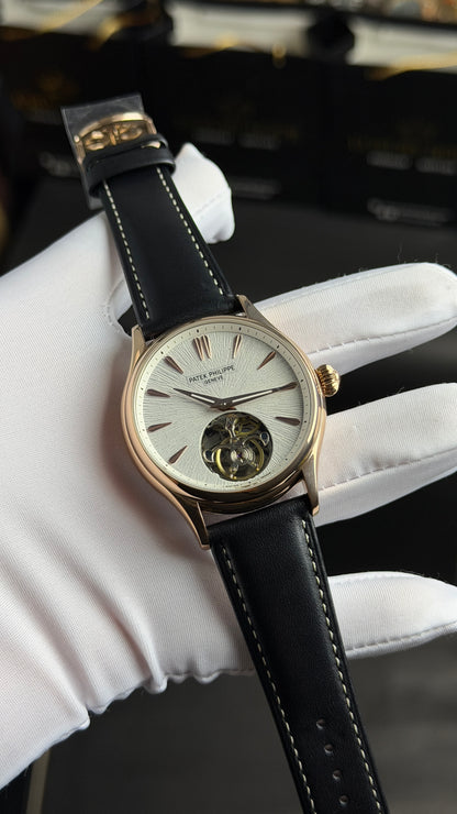 Rose Gold with White Dial.