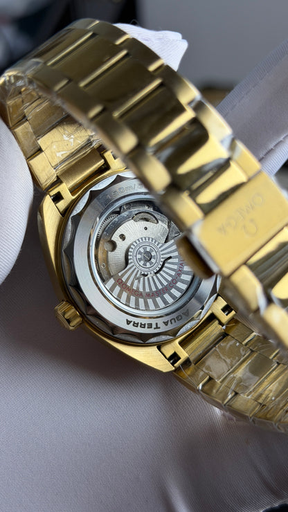 Yellow Gold with Olive Green Dial.