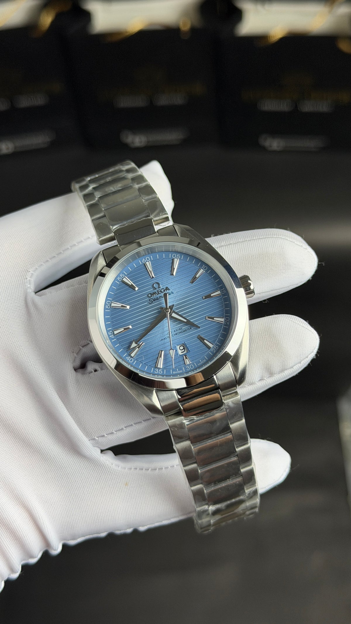 Silver with Sky Blue Dial.