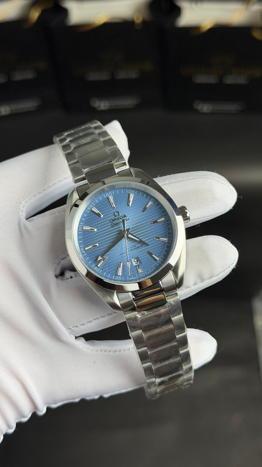 Silver with Sky Blue Dial.