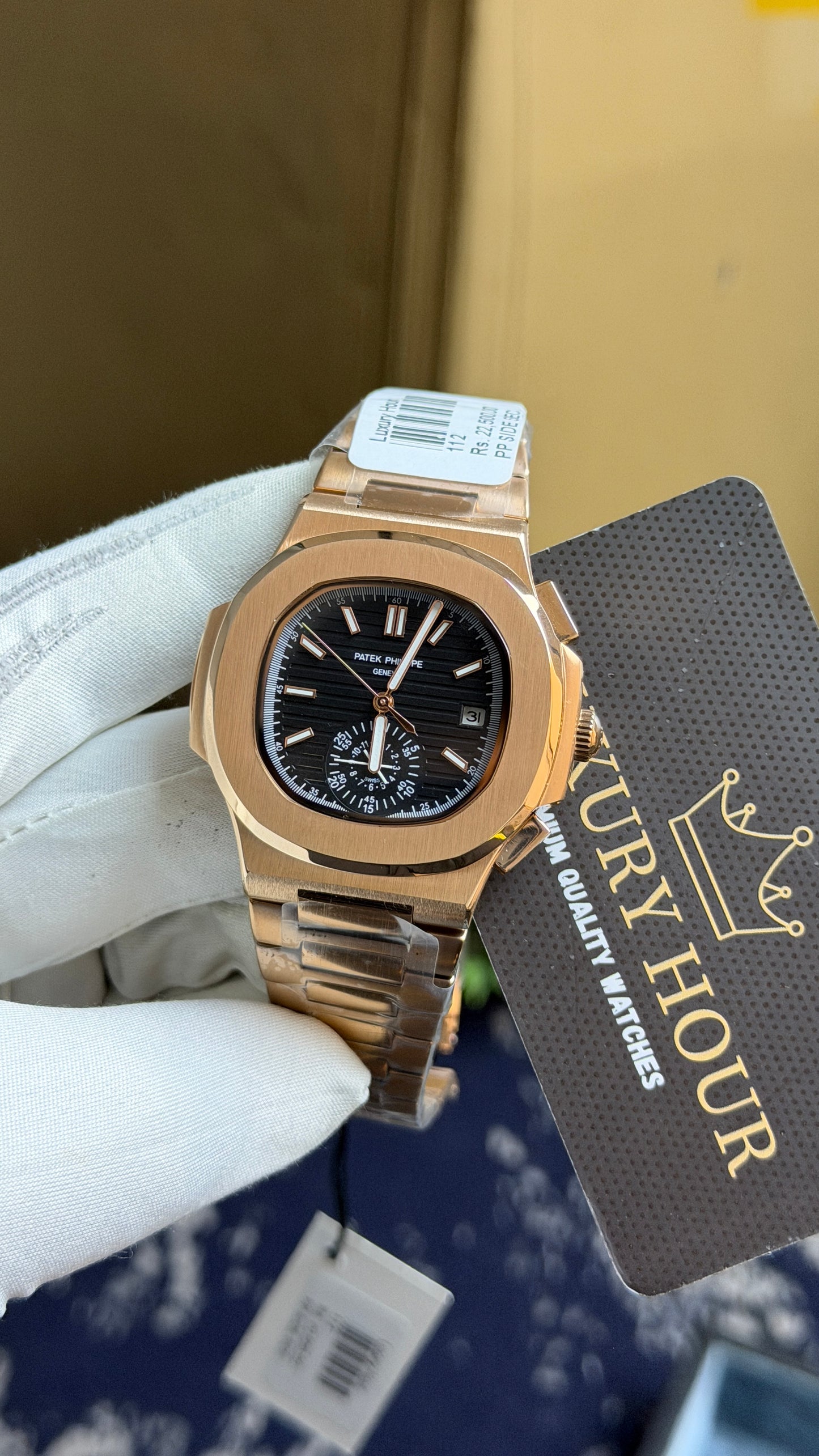 Rose Gold with Black Dial.