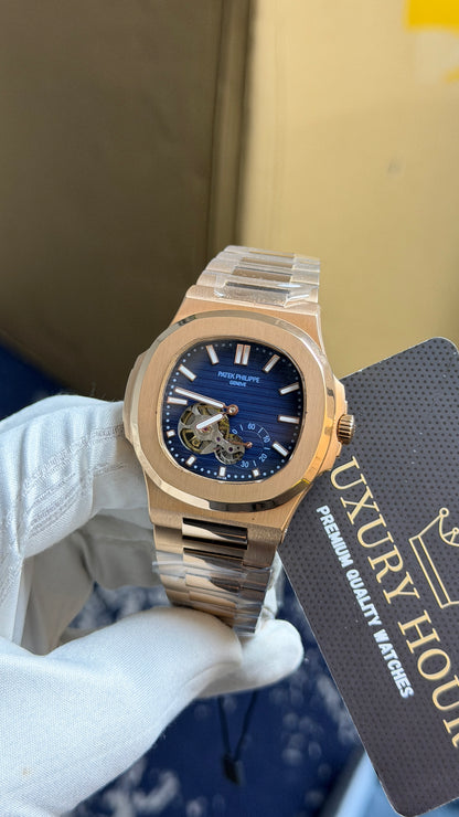 Rose Gold with blue Dial.