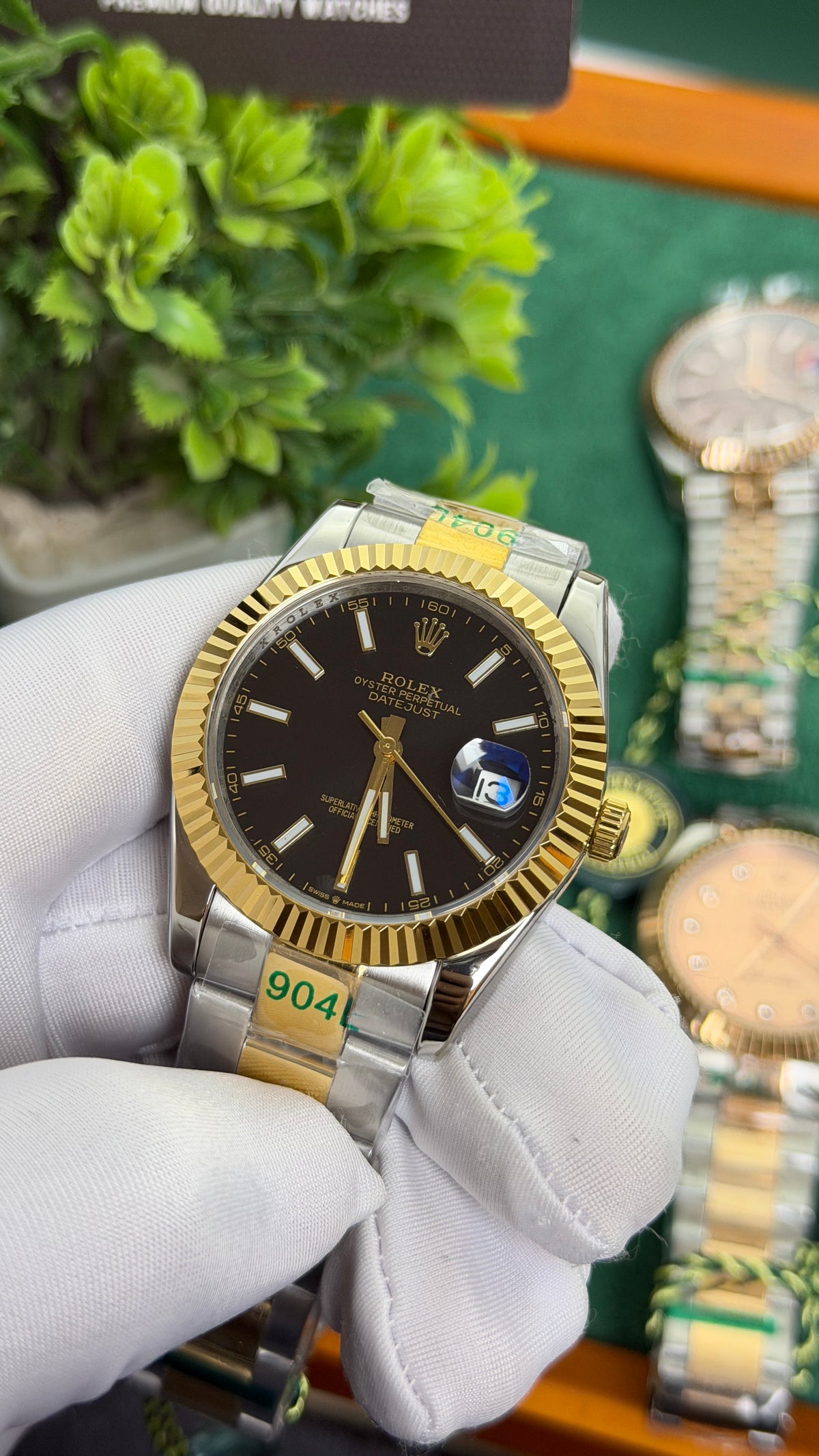 Yellow Gold Two Tone with Black Dial.