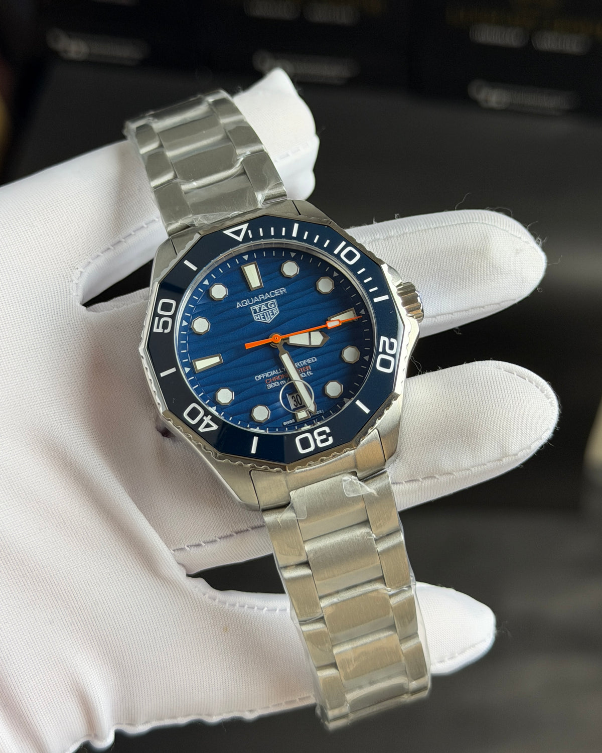 Silver with Blue Dial.