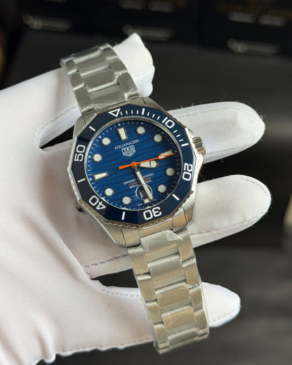 Silver with Blue Dial.