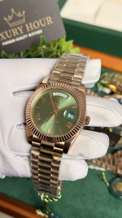 Rose Gold with Green Dial.