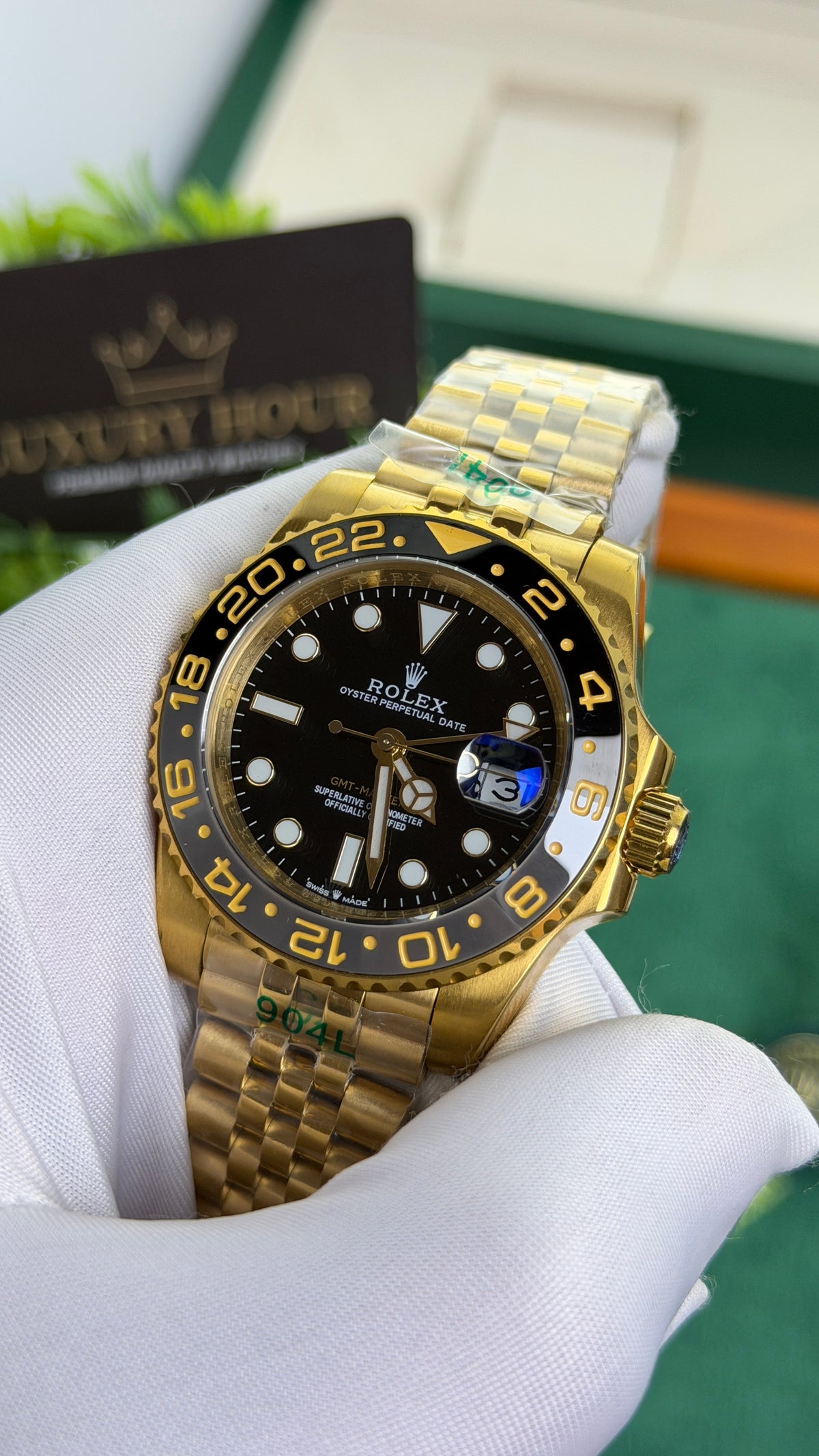 Yellow Gold with Black Dial.
