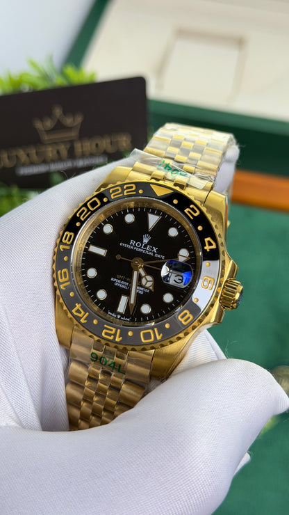 Yellow Gold with Black Dial.