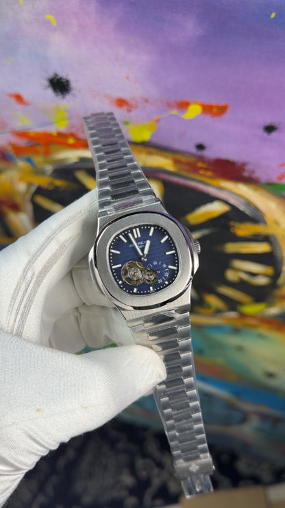 Silver with blue dial