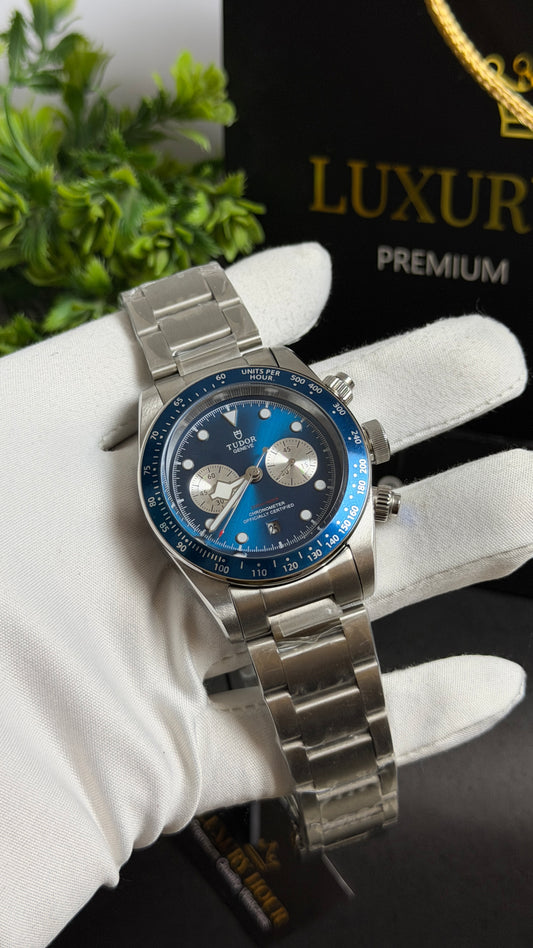 Silver with Blue Dial.