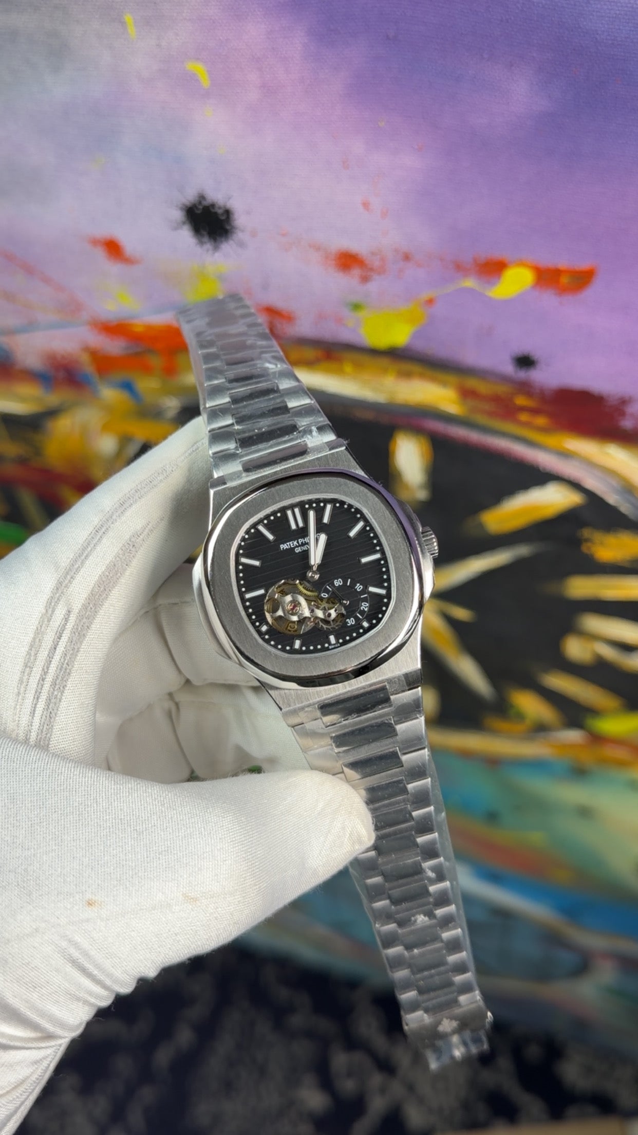 Silver with black dial