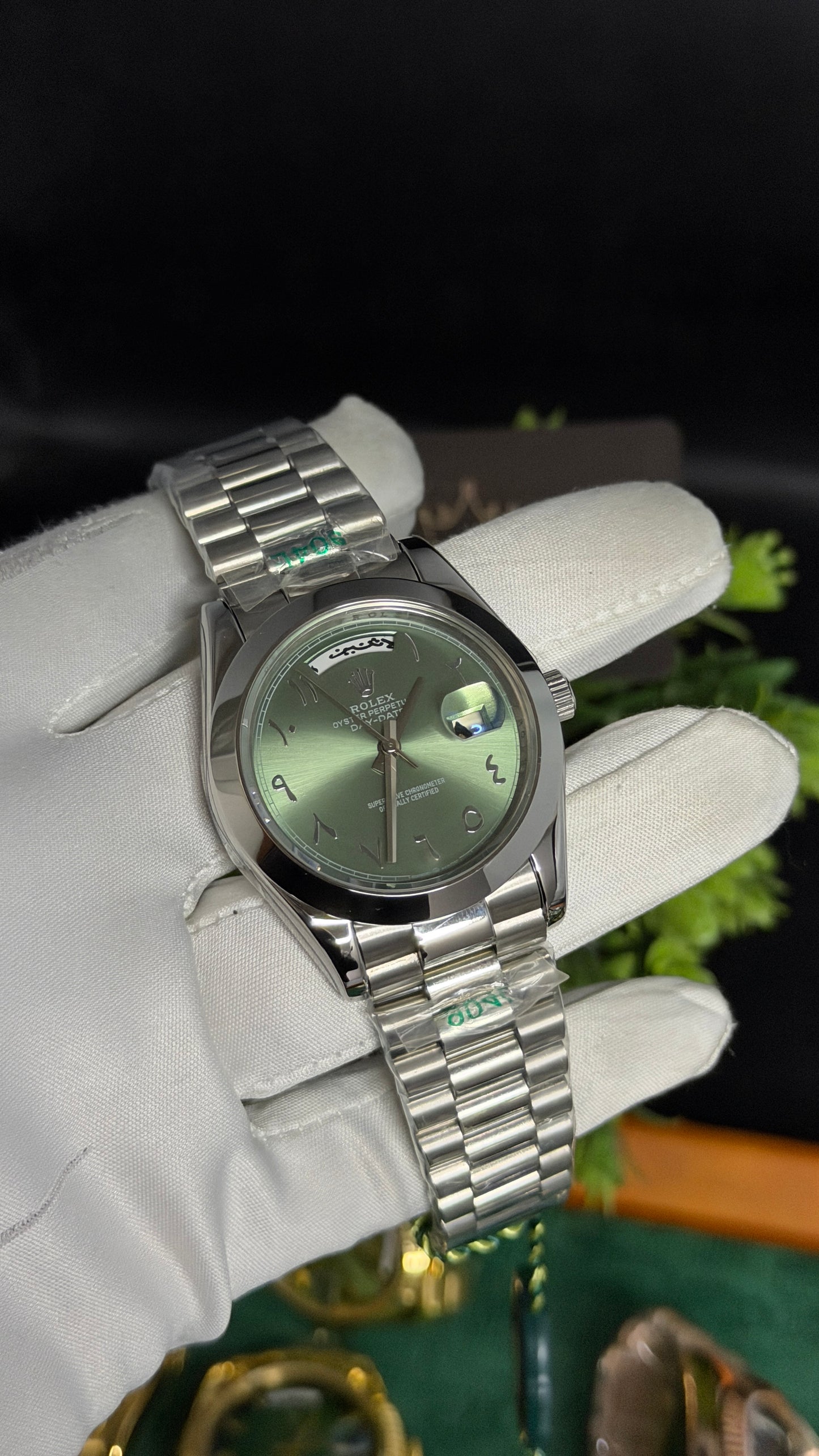 Silver with Green Dial
