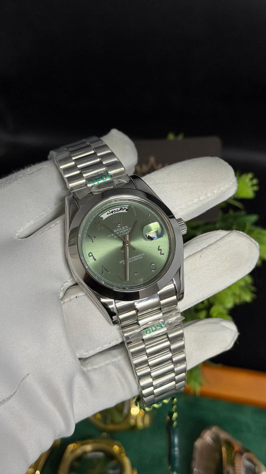 Silver with Green Dial