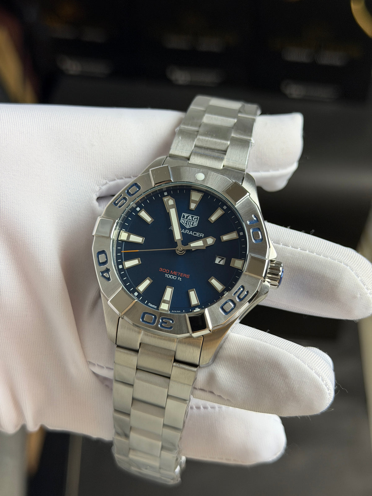 Silver with Blue Dial.