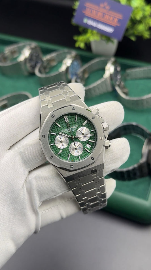 Silver with green dial
