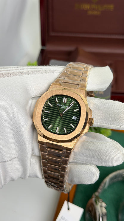 Rose Gold with Green Dial.