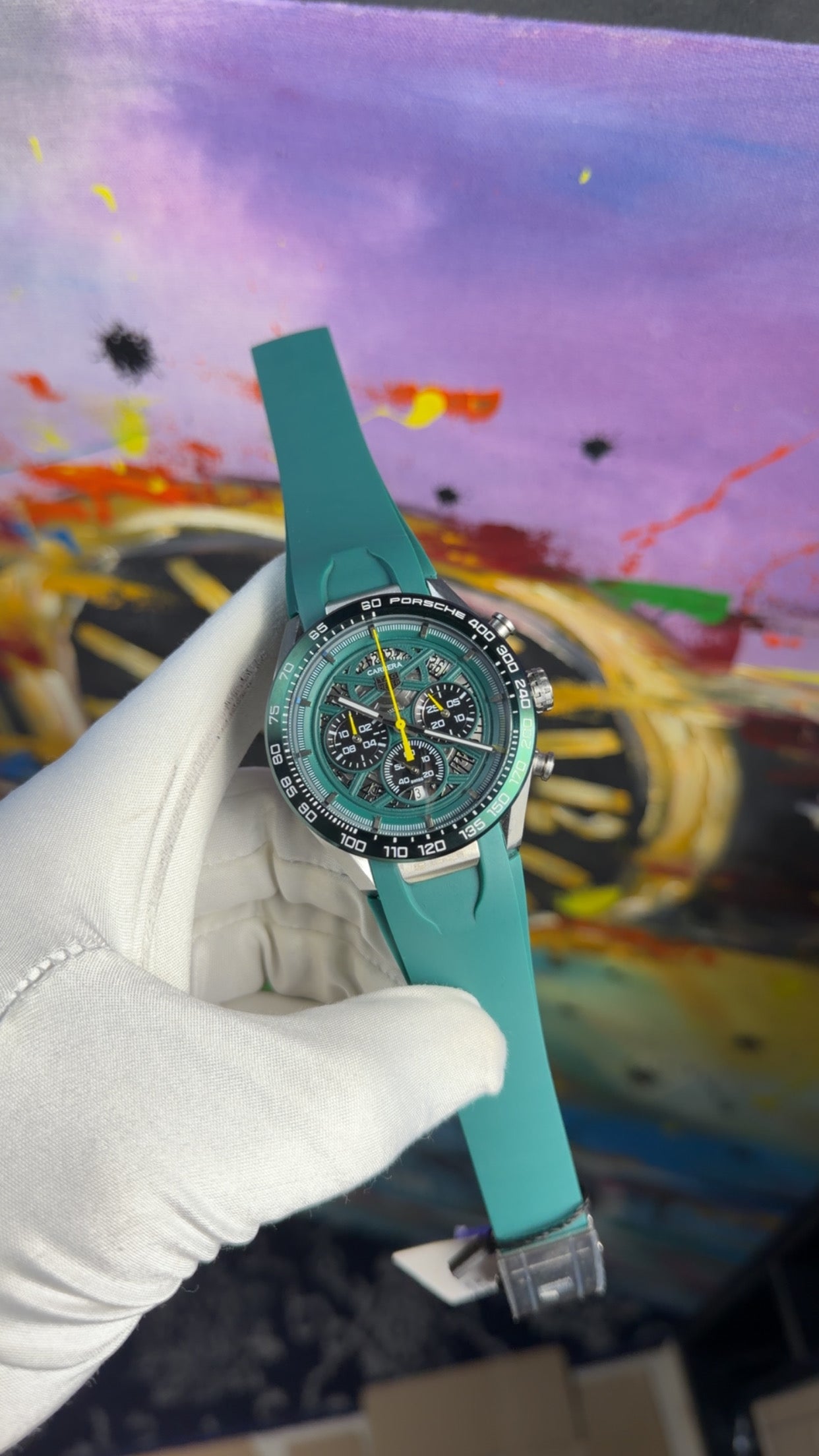 Silver with green dial