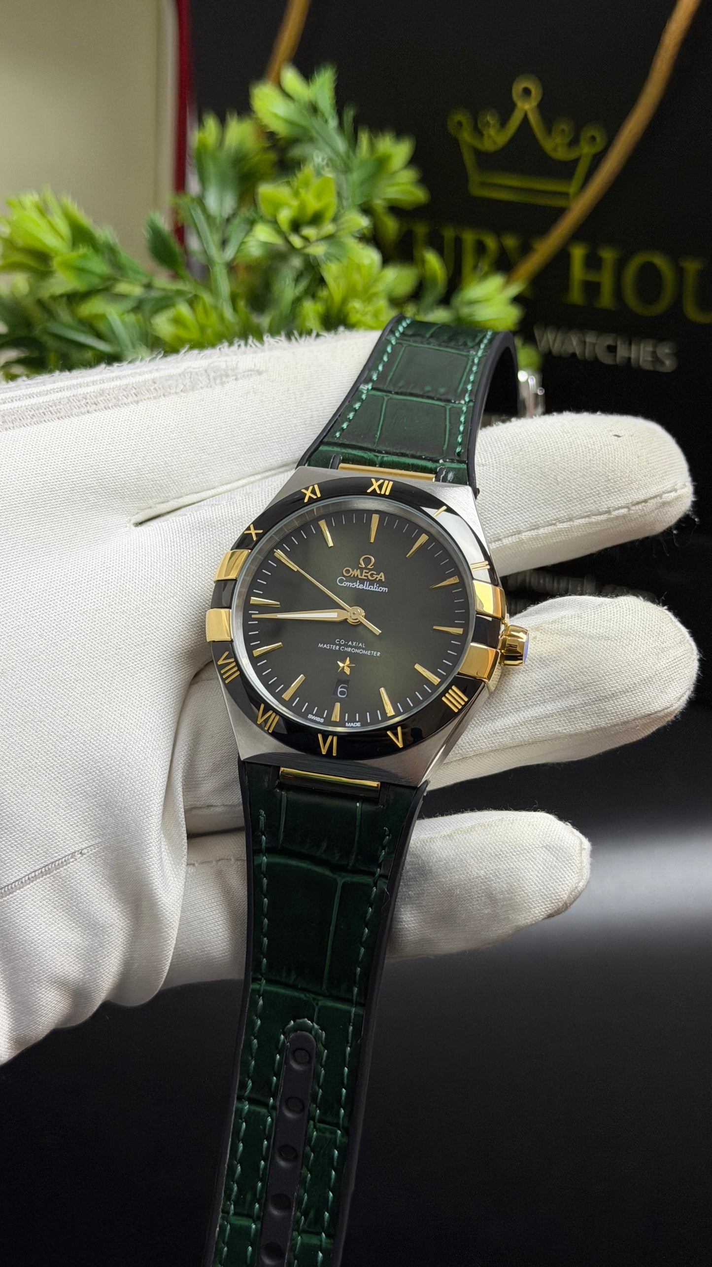 Silver with Green Dial.