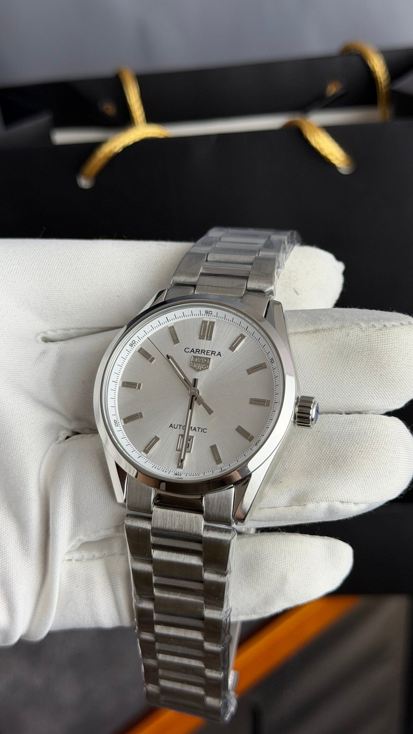 Silver with White Dial.