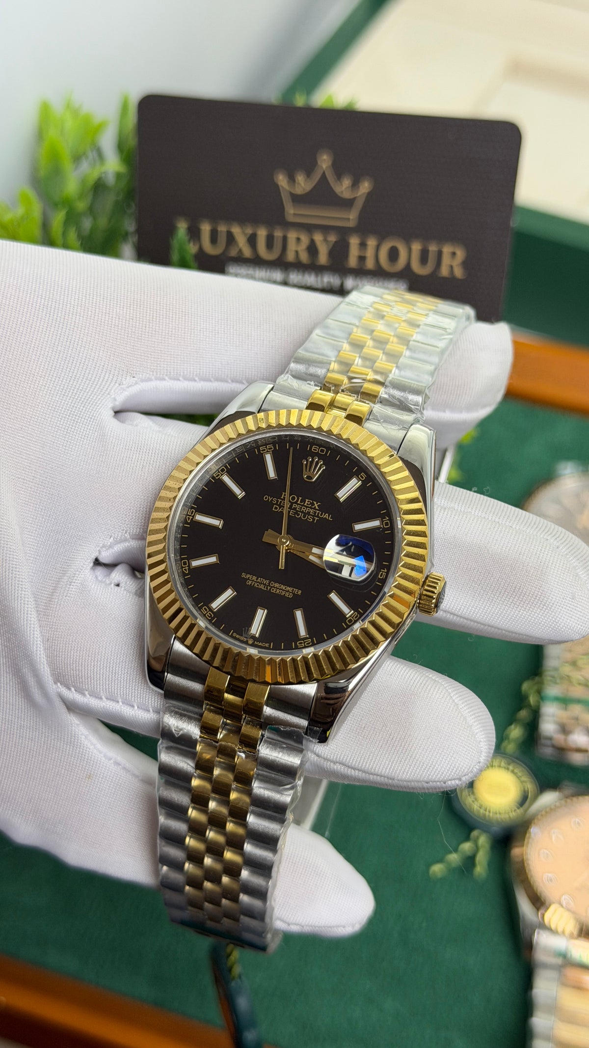 Yellow Gold Two Tone with Black Dial.