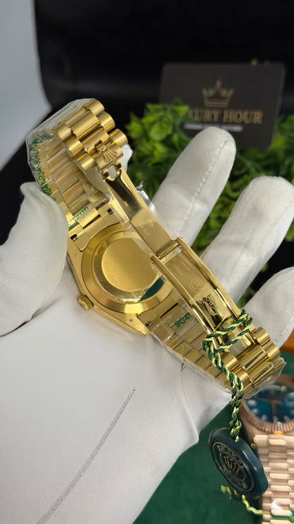 Yellow Gold with Green Dial