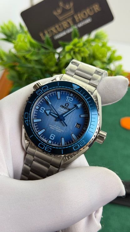 Silver with Blue Dial.