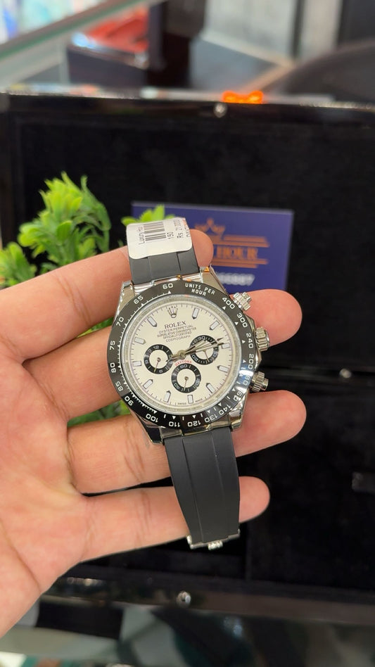 Silver with white dial.