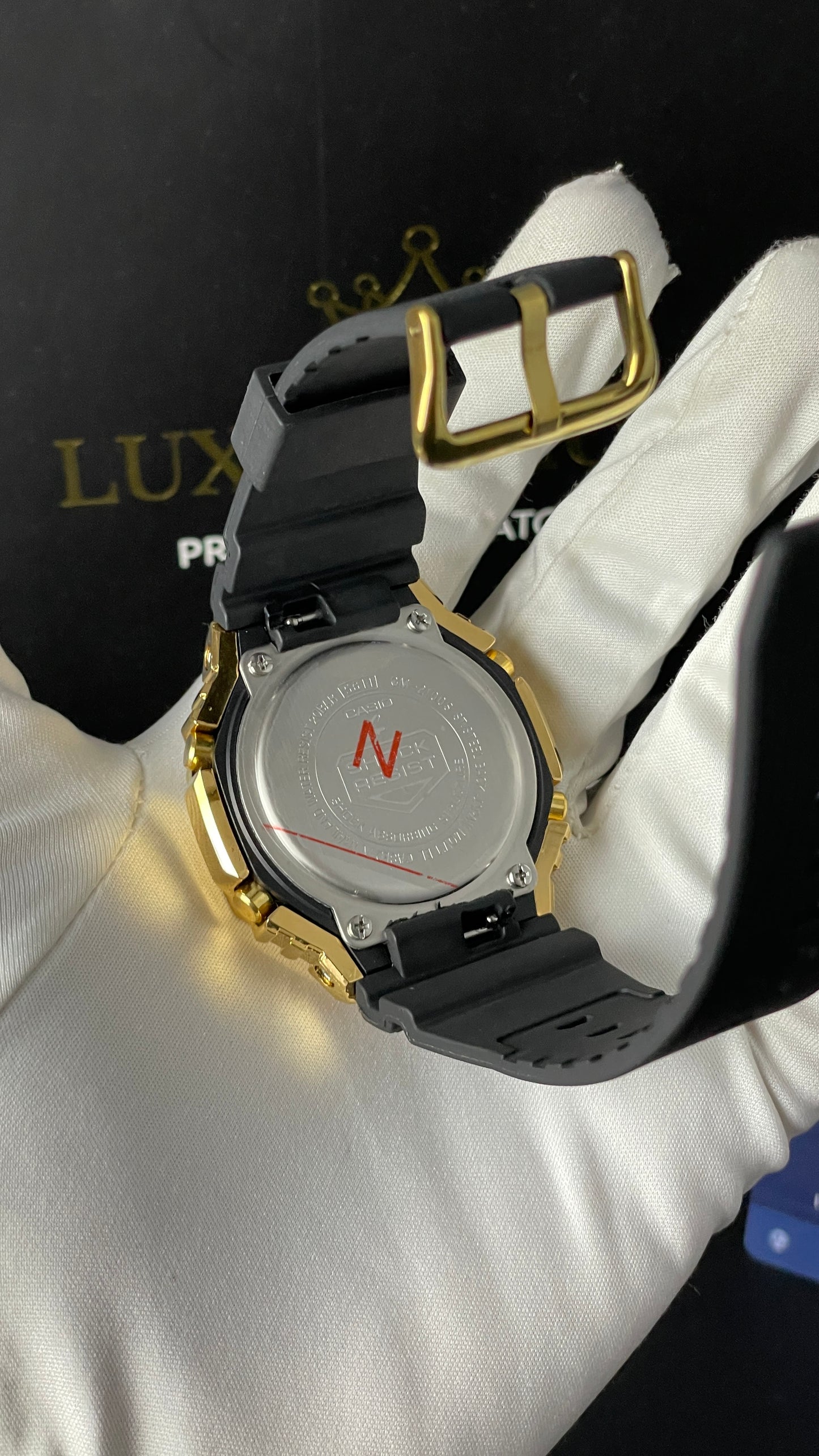 Yellow Gold with Black Dial.