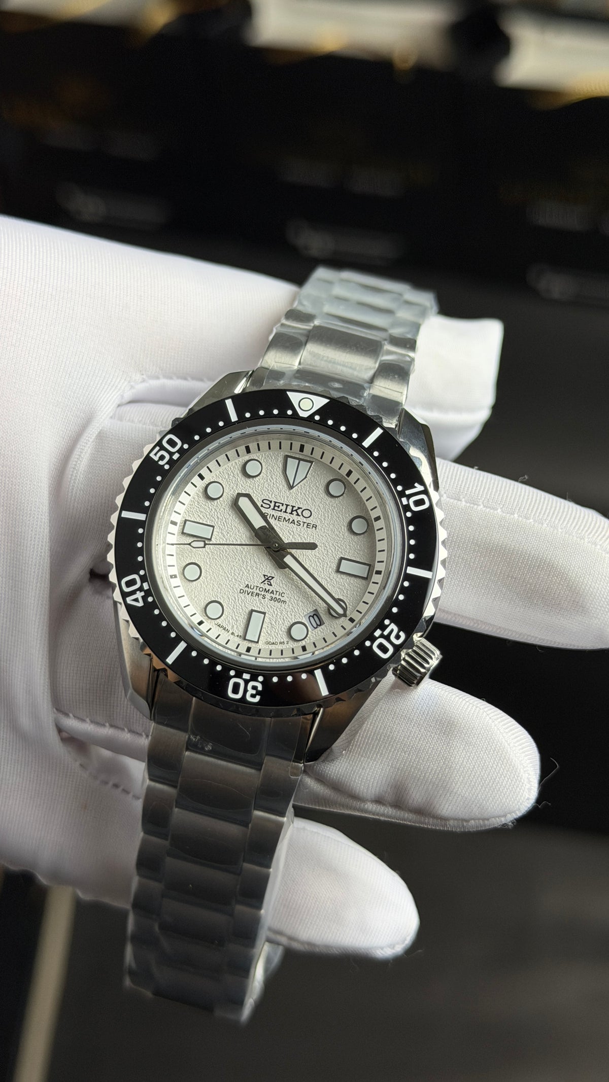 Silver with White Dial.