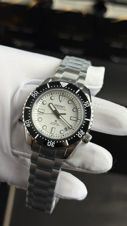 Silver with White Dial.