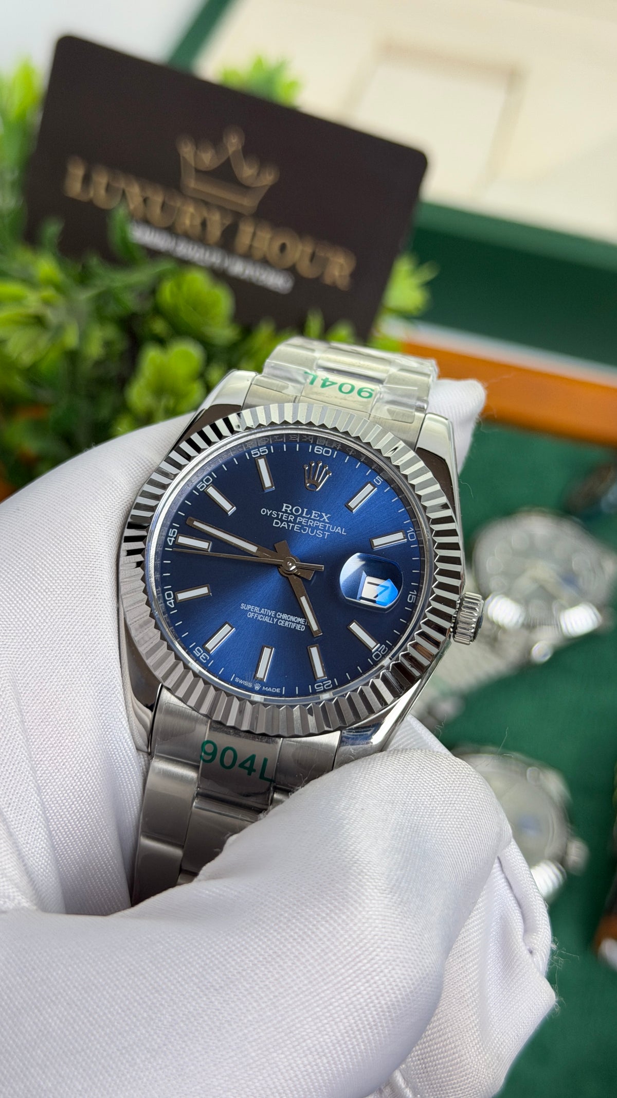 Silver with Blue Dial.