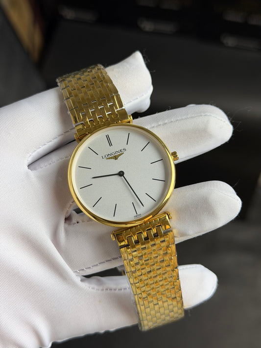 Yellow Gold with White Dial.