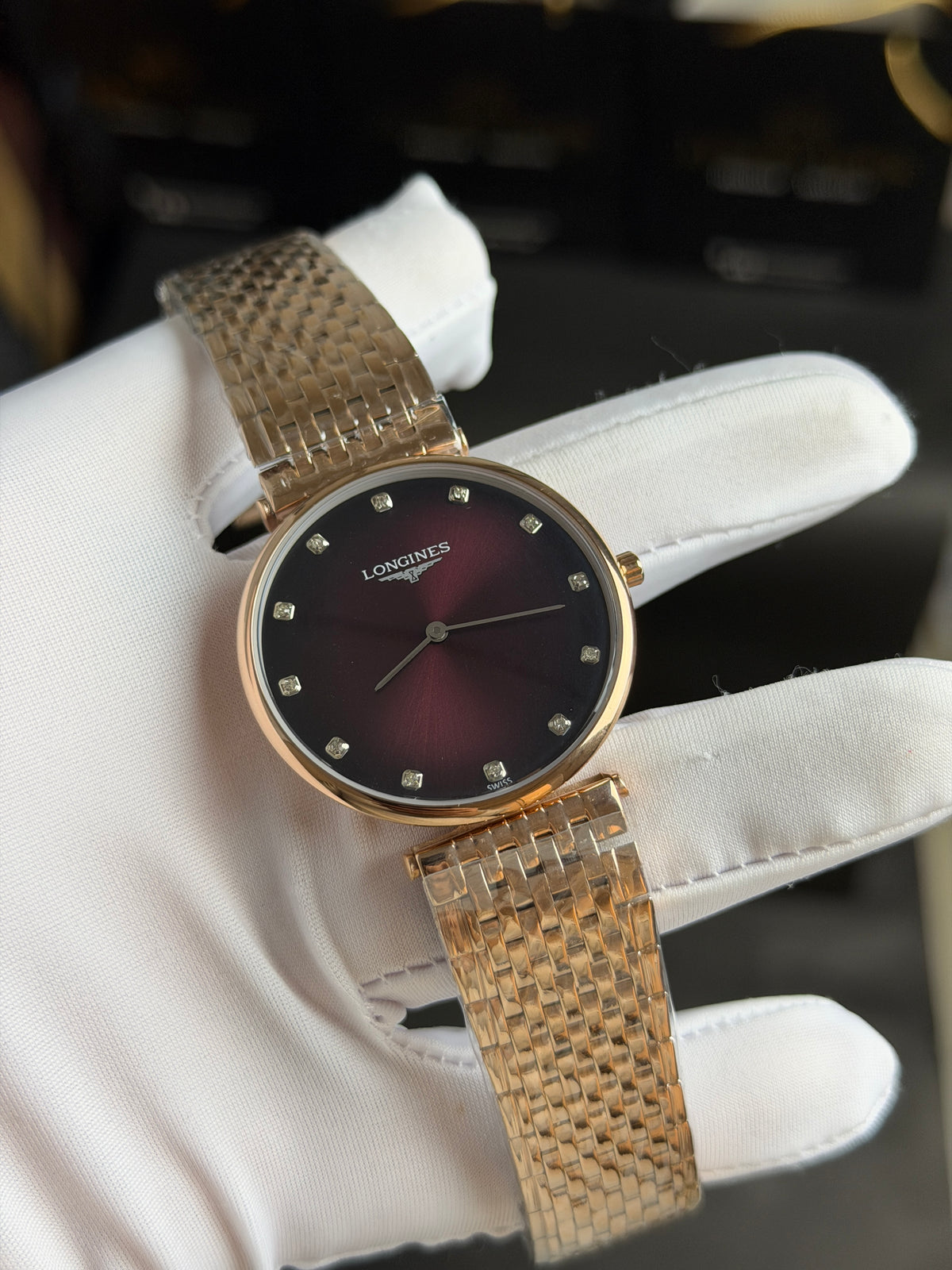 Rose Gold with Maroon Dial.