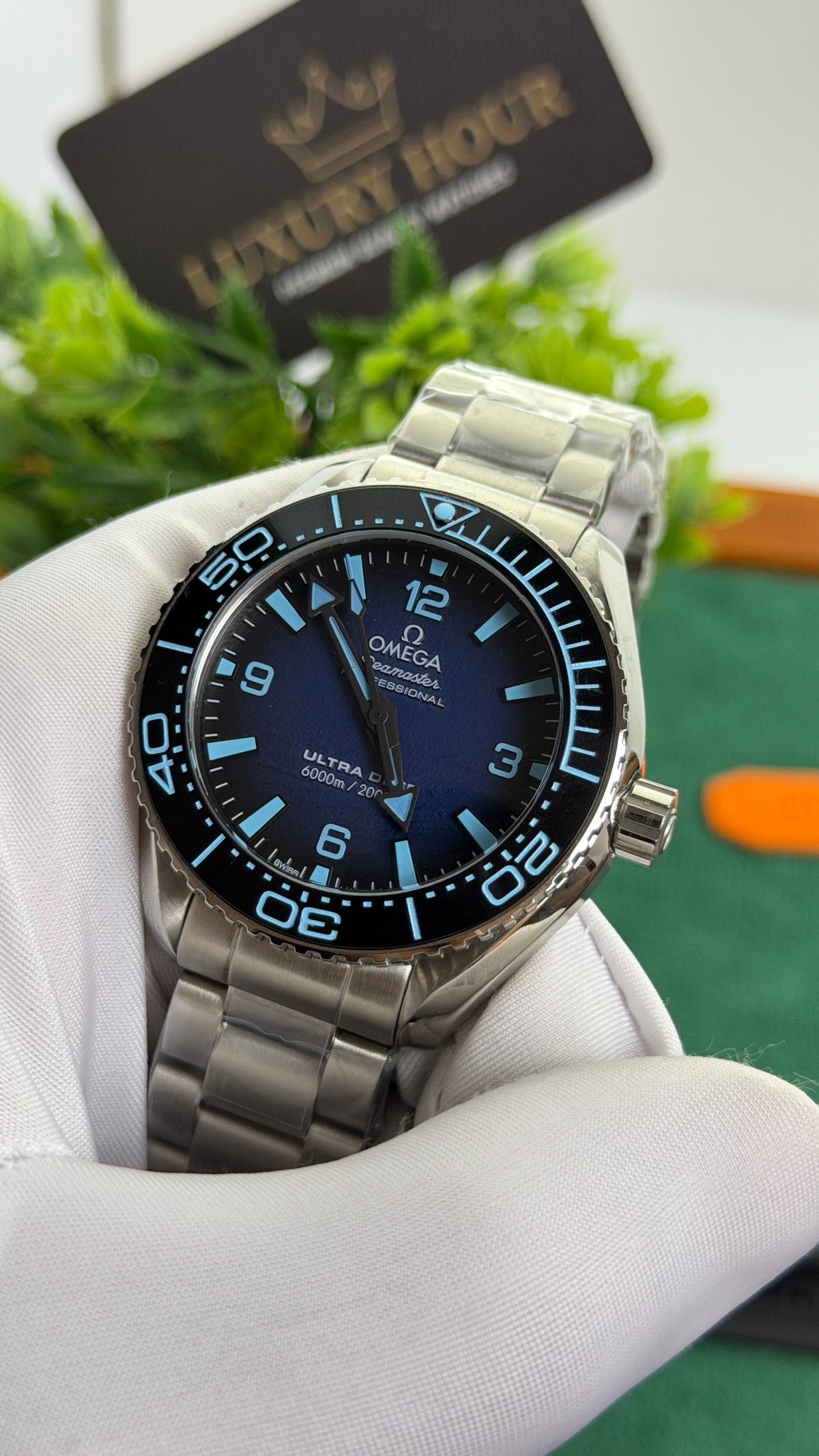Silver with Blue Dial.