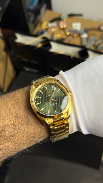 Yellow Gold with Olive Green Dial.