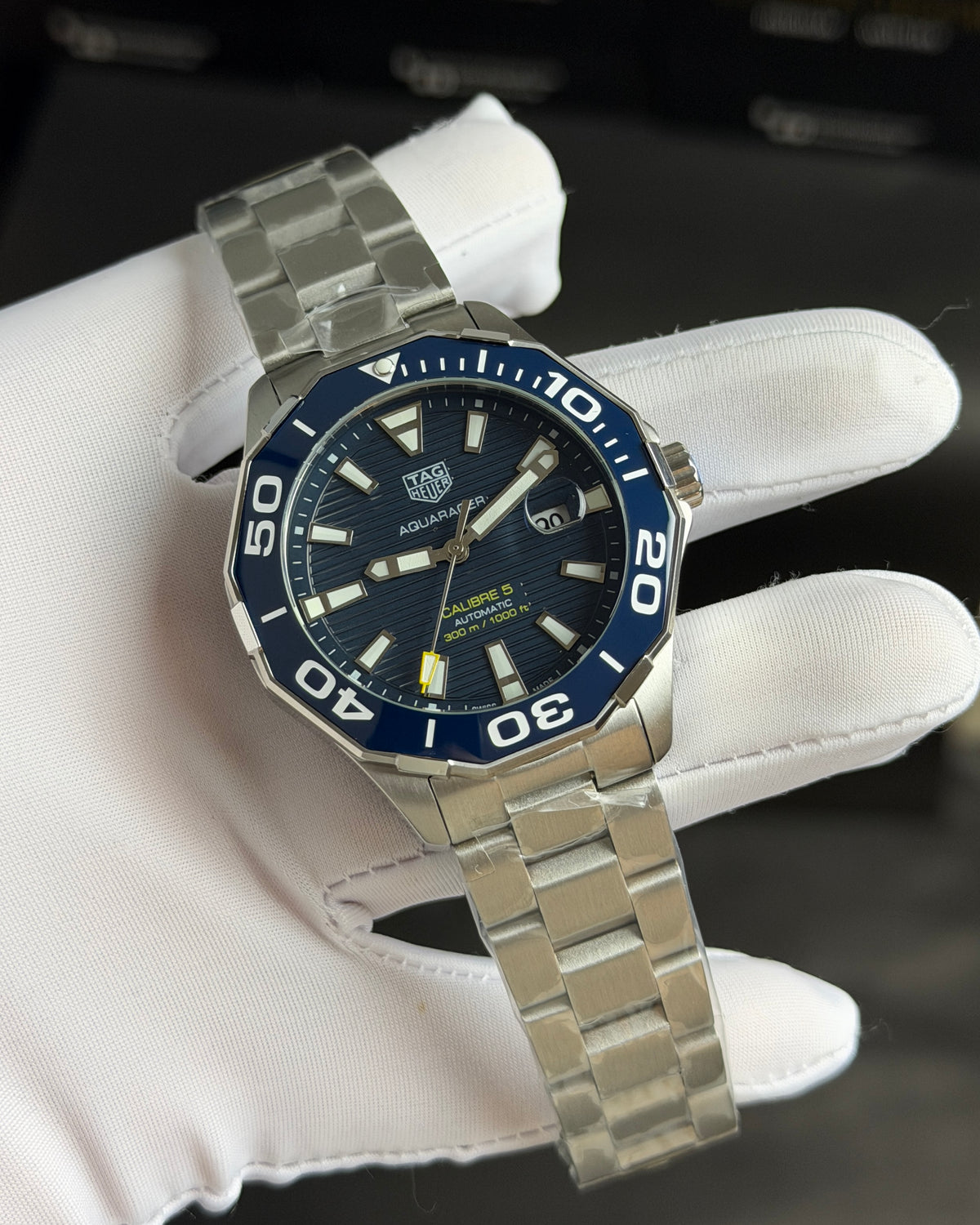 Silver with Blue Dial.