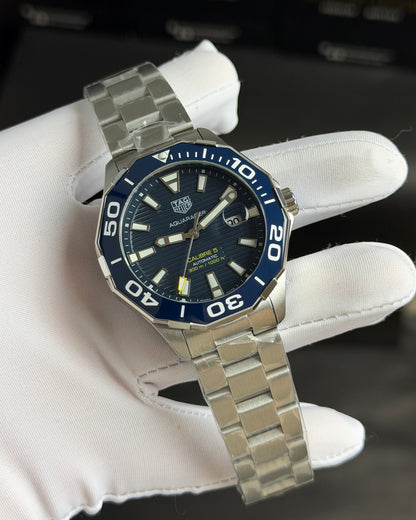 Silver with Blue Dial.