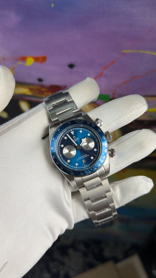 Silver with blue dial🔥