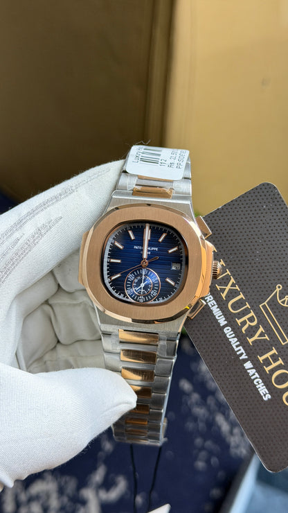 Rose Gold Two Tone with blue Dial.