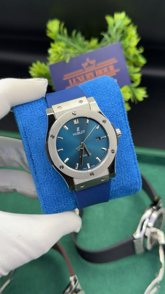 Silver with blue dial