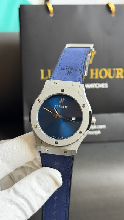 Silver with Blue Dial.