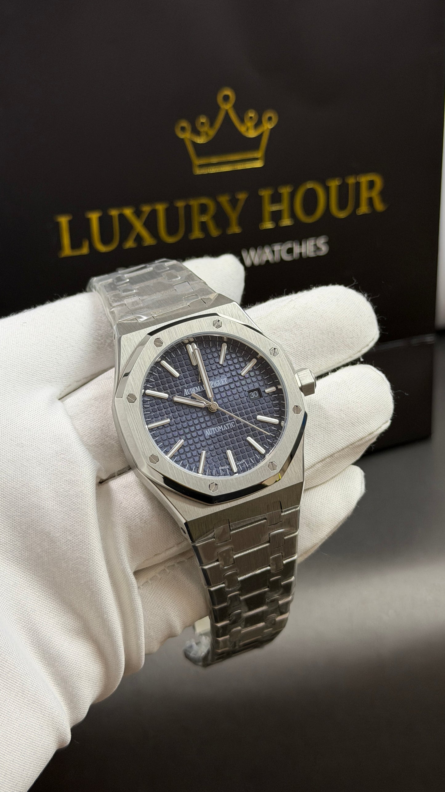 Silver with Blue Dial.