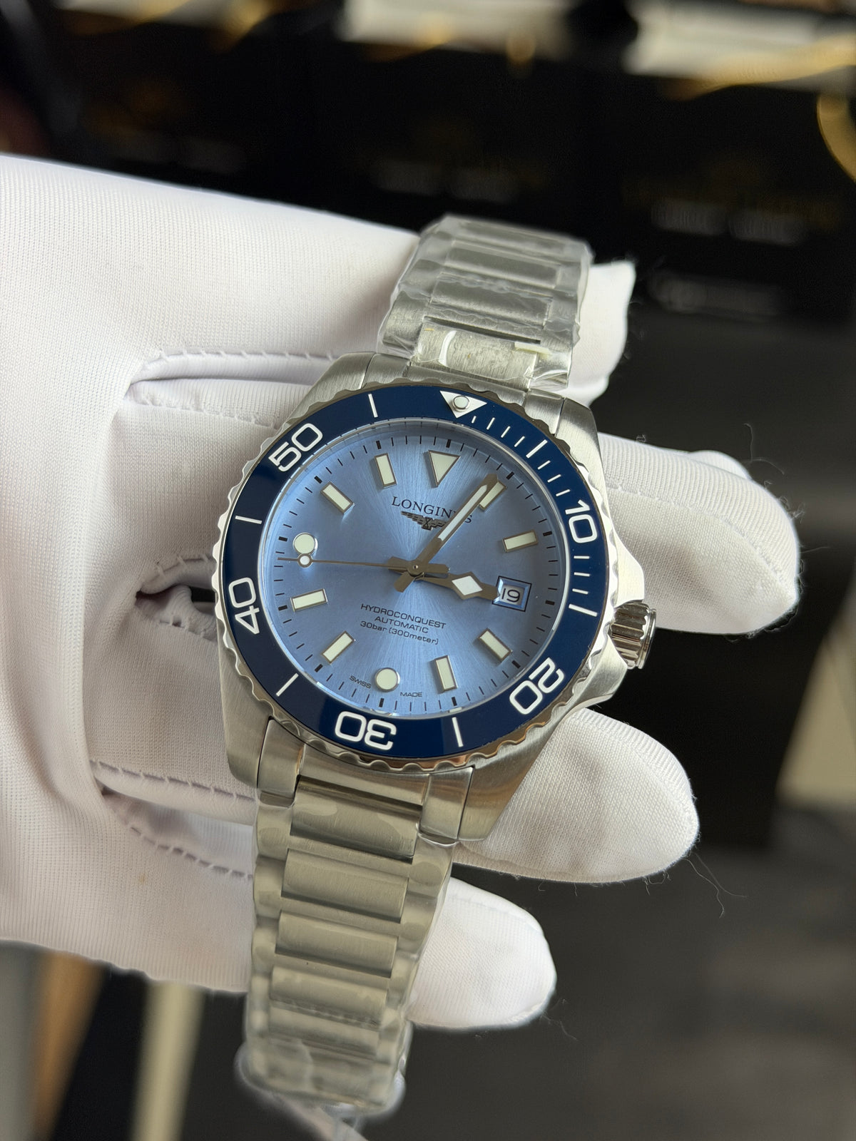Silver with Sky Blue Dial.