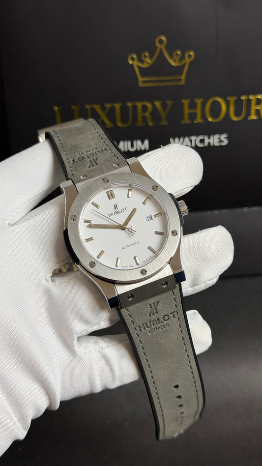 Silver with White Dial.