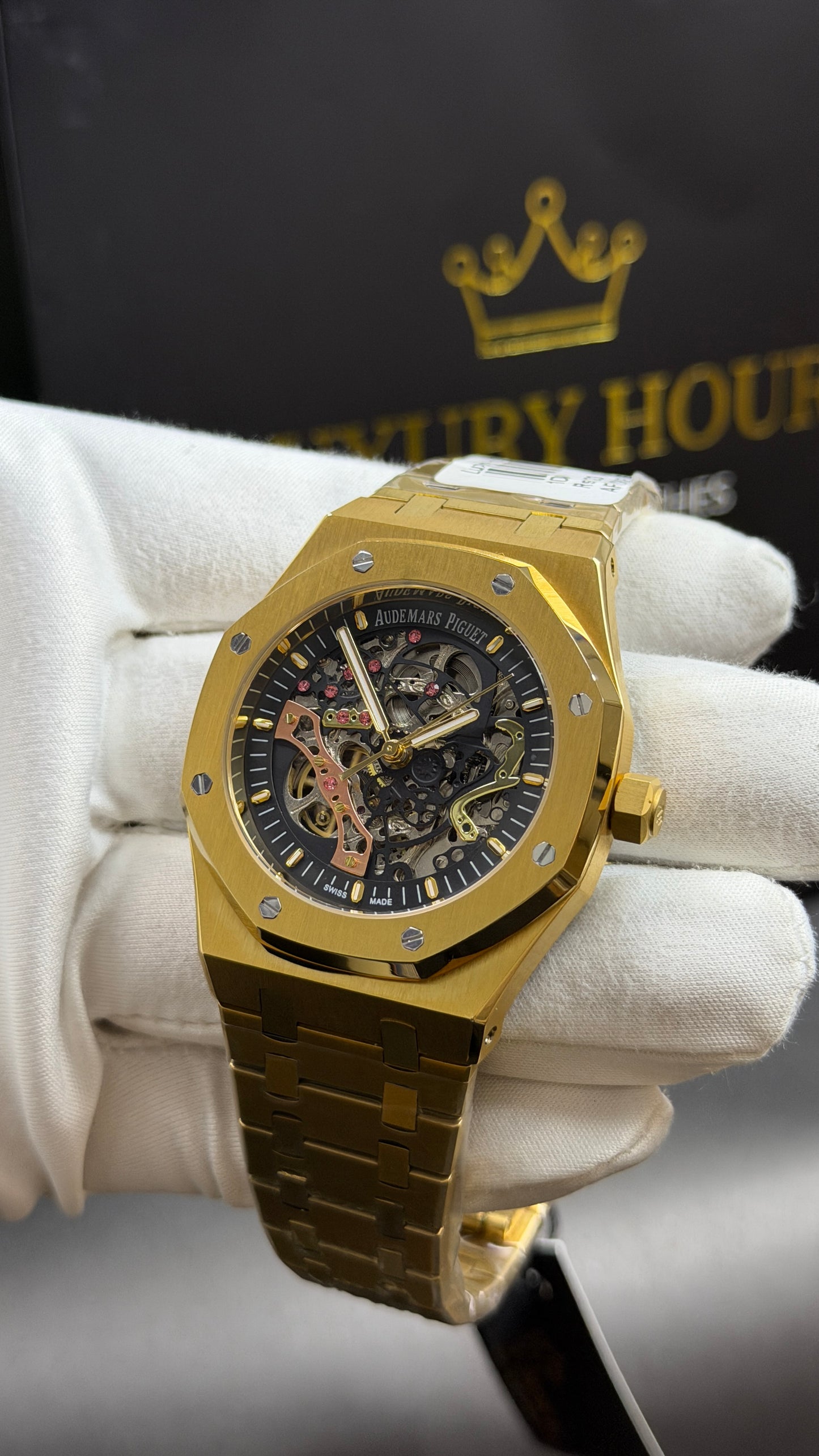 Yellow Gold with Black Skeleton Dial.