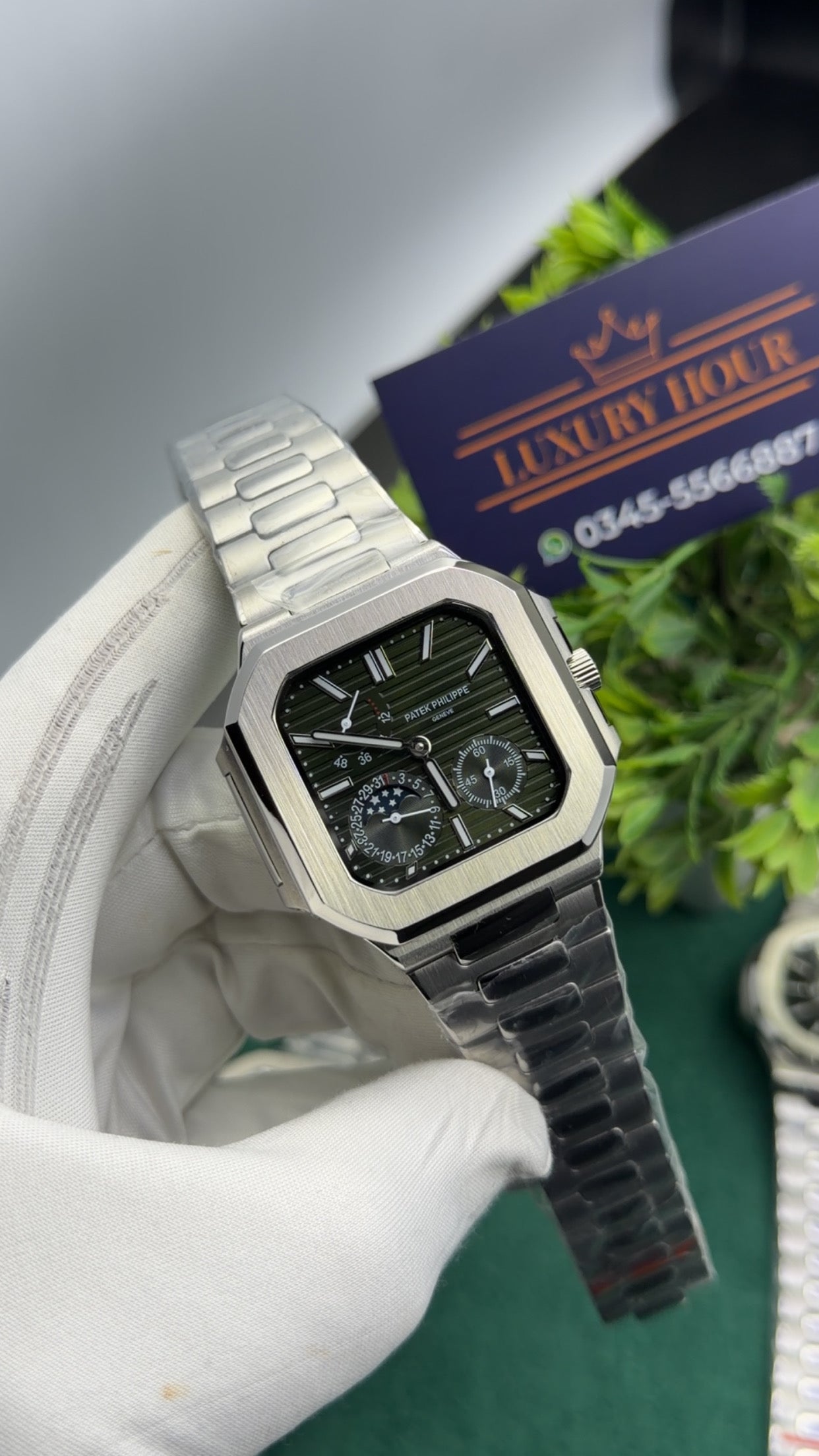 Silver with green dial