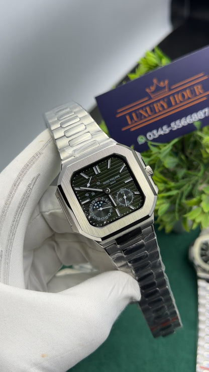 Silver with green dial