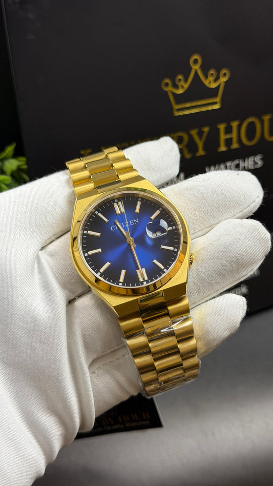 Yellow Gold with Aqua Dial.